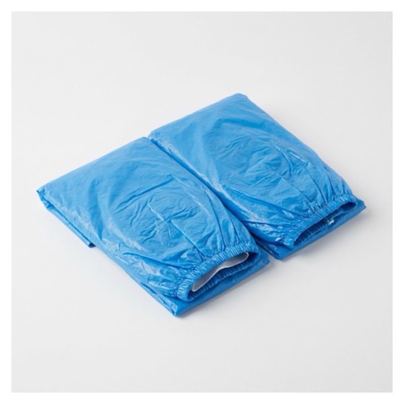 Paio di copriscarpe monouso azzurri con elastico