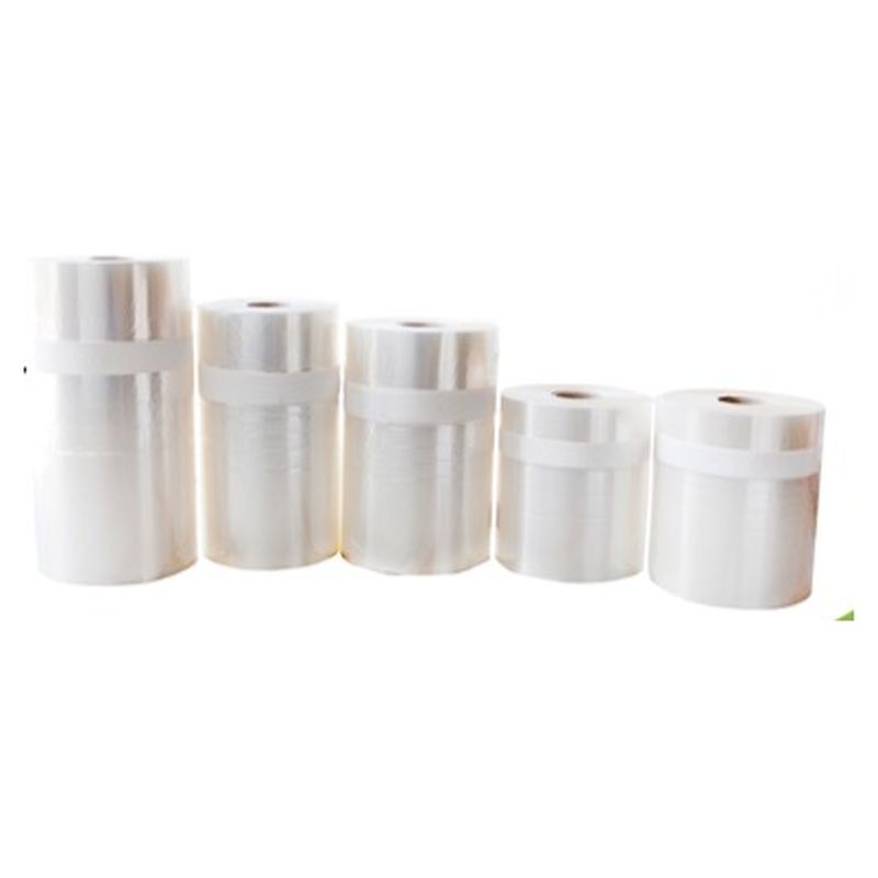 Five reels of clear flowpack film with a printed white stripe