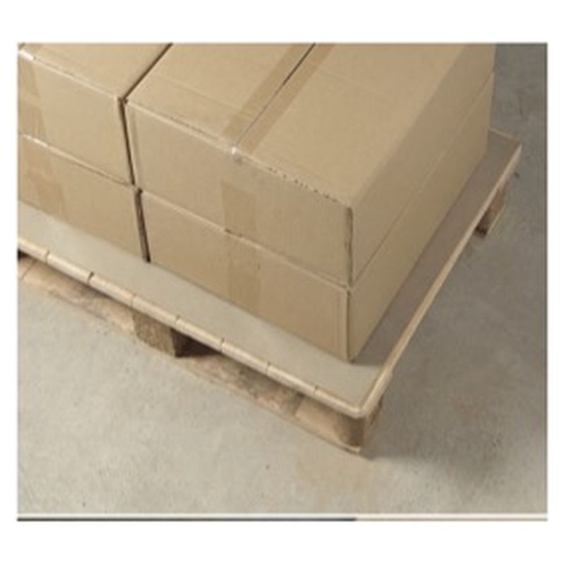 Cardboard boxes stacked on a pallet over a sheet of grey hidrocuero paper
